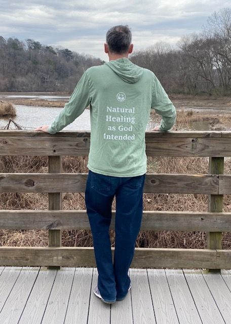 Close-up of aloe vera plant with thick, bluish-green leaves and spiky edges.