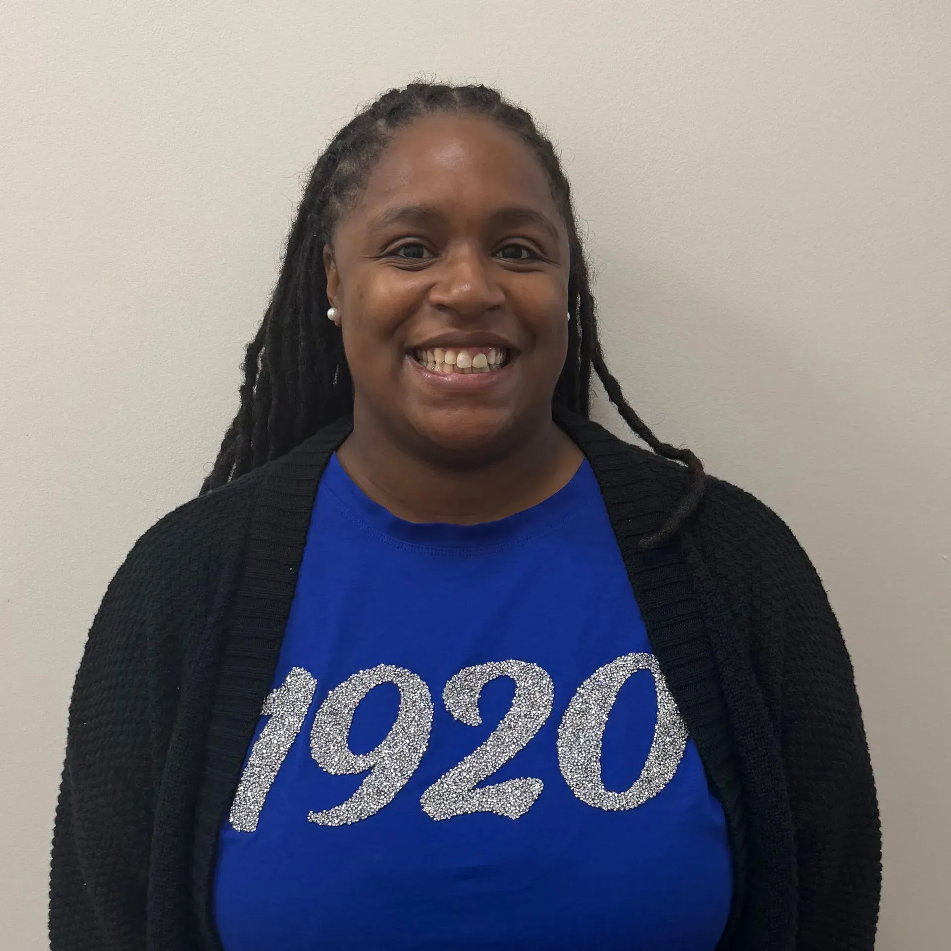 Woman wearing blue shirt with 