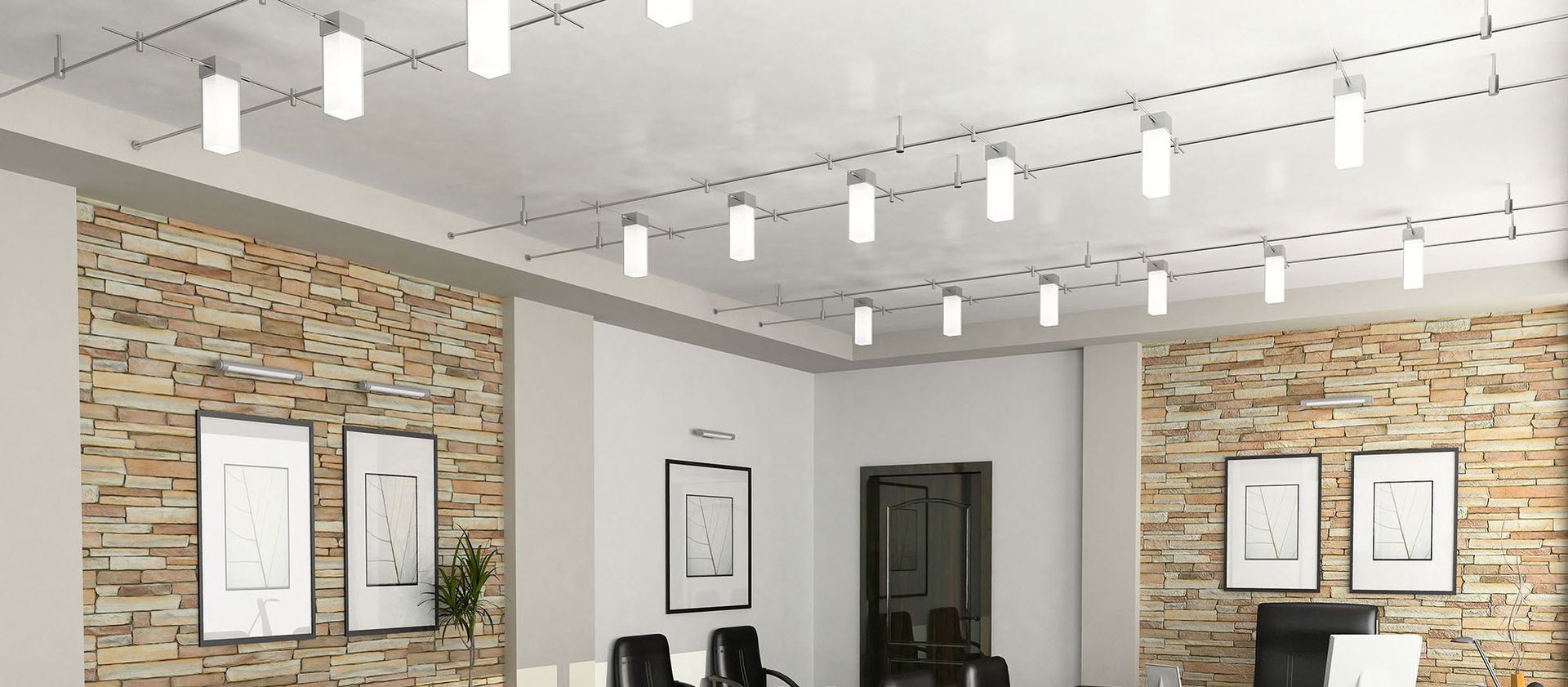 There are many lights hanging from the ceiling in this room.