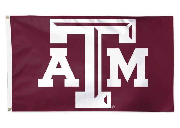 The Texas A&M University logo, a white 'ATM' monogram on a maroon rectangular flag.