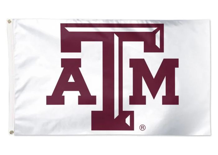 A white flag featuring a maroon Texas A&M University 'ATM' logo.
