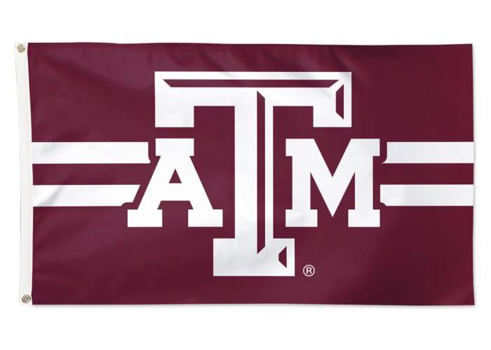 Maroon Texas A&M University logo flag featuring a white 'ATM' monogram centered with two white horizontal stripes.