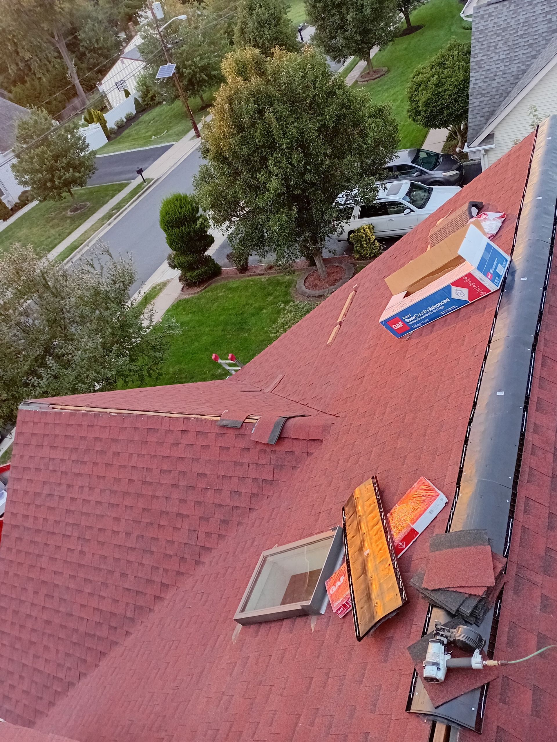 Tilted view of a red roof