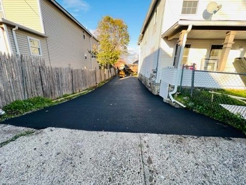 newly paved walkway between two houses
