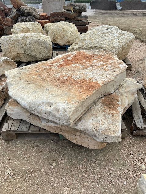 A pile of rocks sitting on top of a wooden pallet.