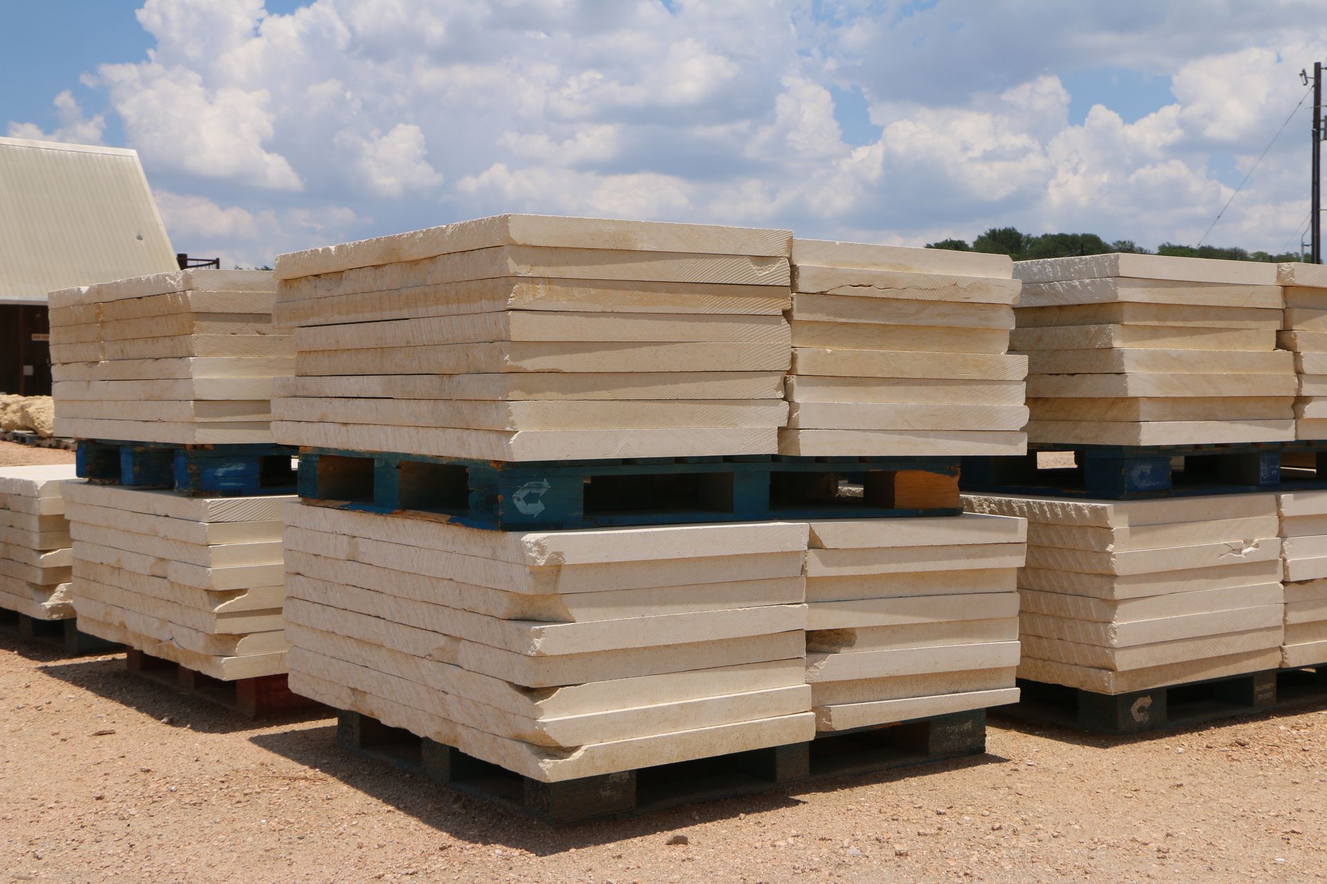 A stack of pallets with the letter g on them