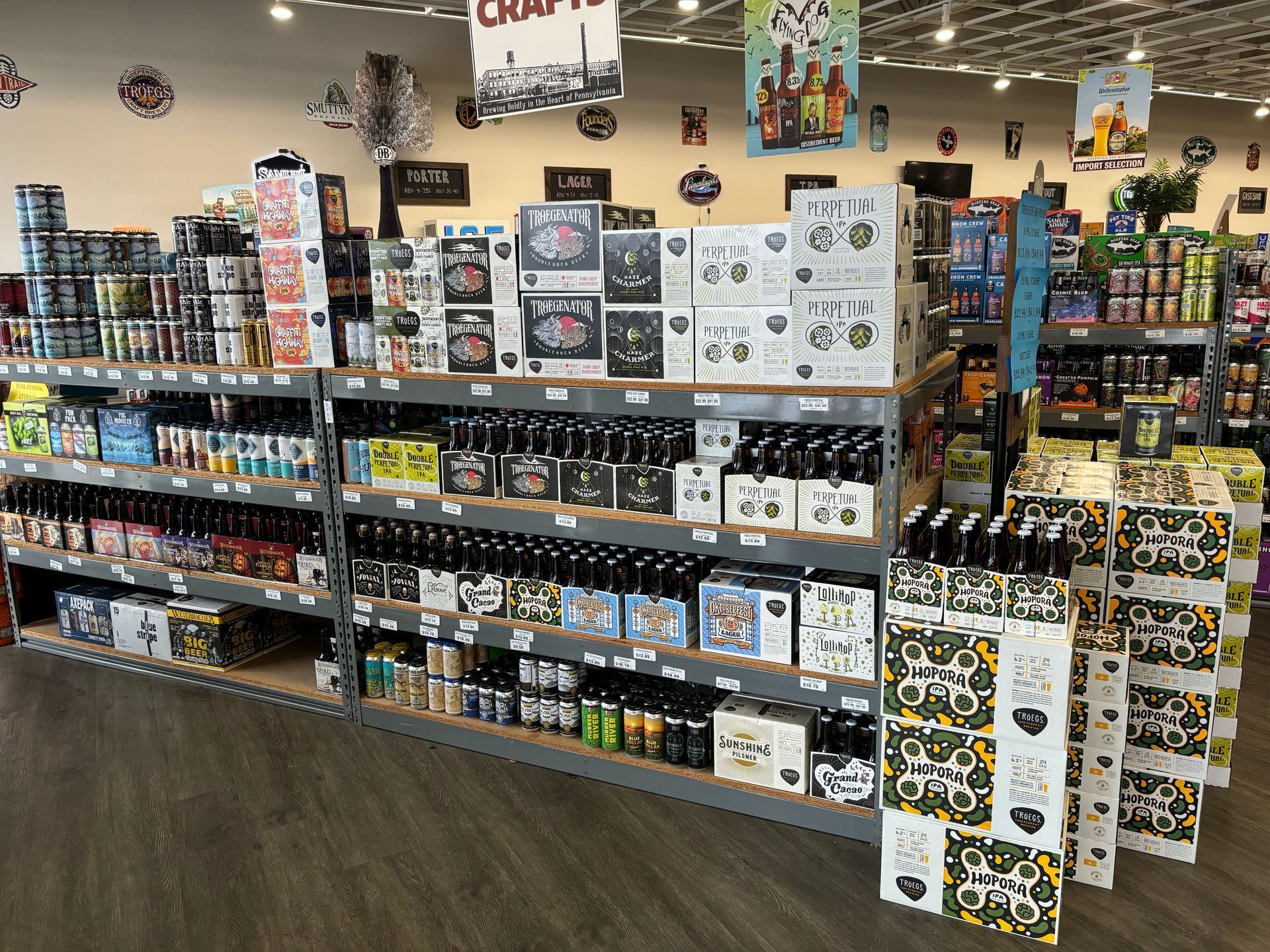 A store filled with lots of beer bottles and boxes