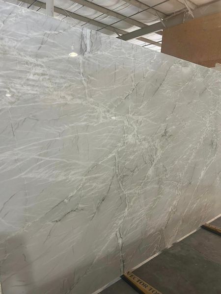 Large gray marble slab with white veining.