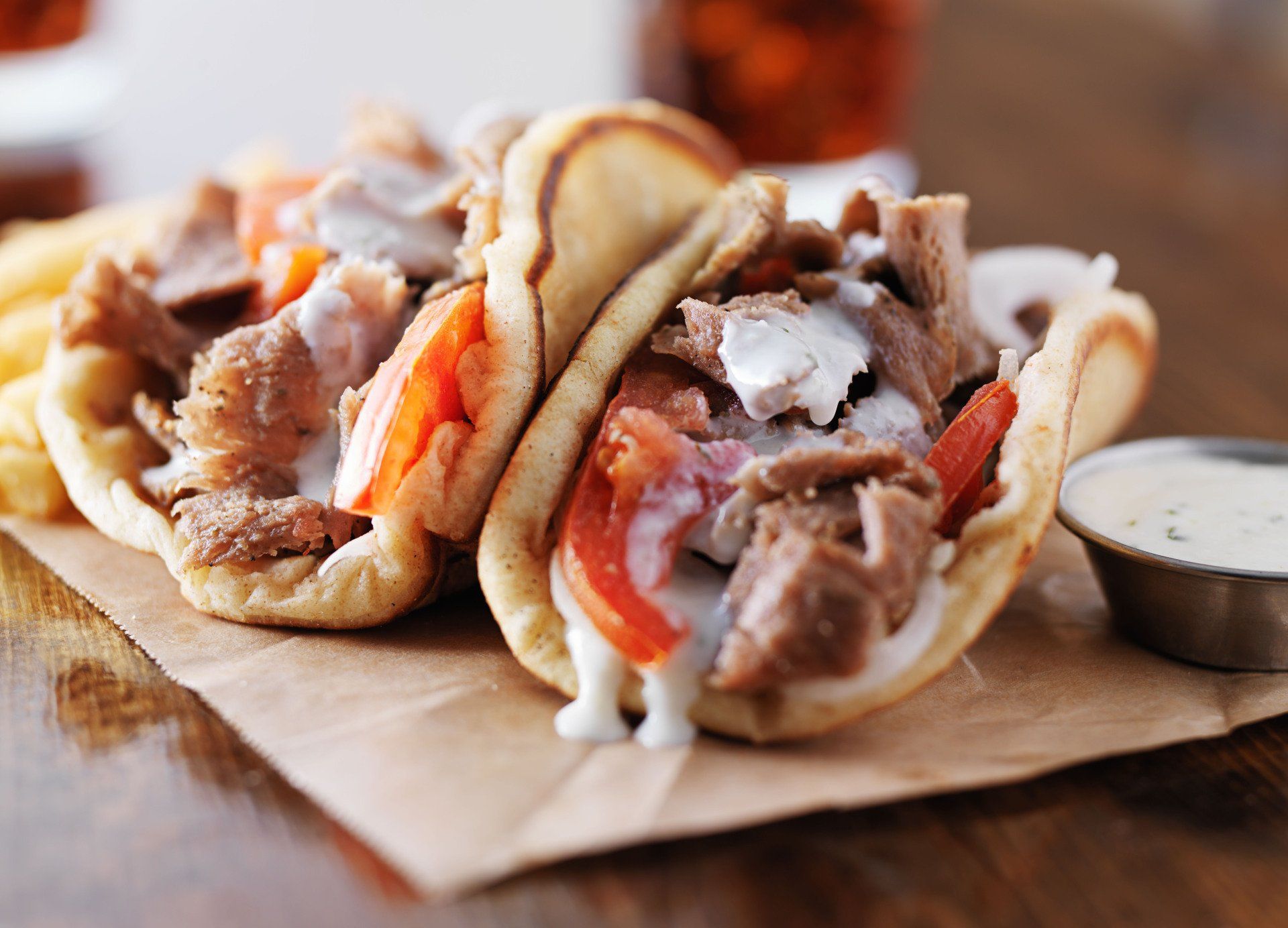 A close up of a gyro sandwich on a table
