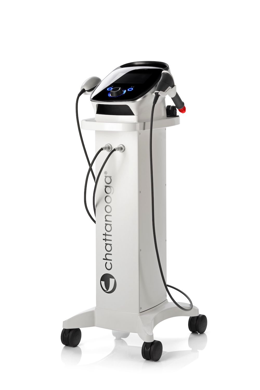 White Chattanoga physical therapy machine with black controls and attached probes.