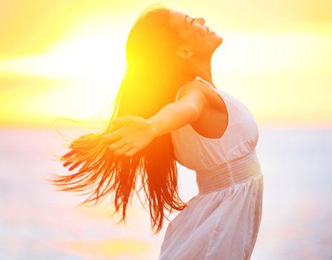 A healthy and happy woman after a chiropractic treatment