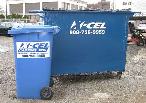 A blue bin that says ' xcel carting inc ' on it