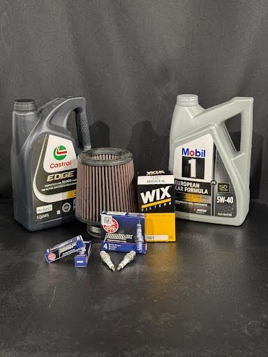 Car maintenance items: oil containers (Castrol, Mobil 1), air filter, WIX filter, spark plugs.