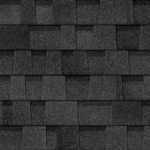 A close-up, top-down view of overlapping dark gray asphalt architectural roof shingles.