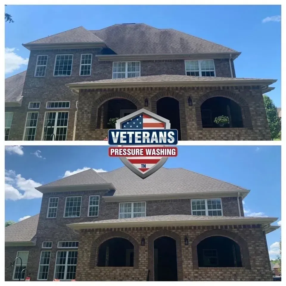 Before and after pressure washing of a two-story brick house, cleaning the roof.