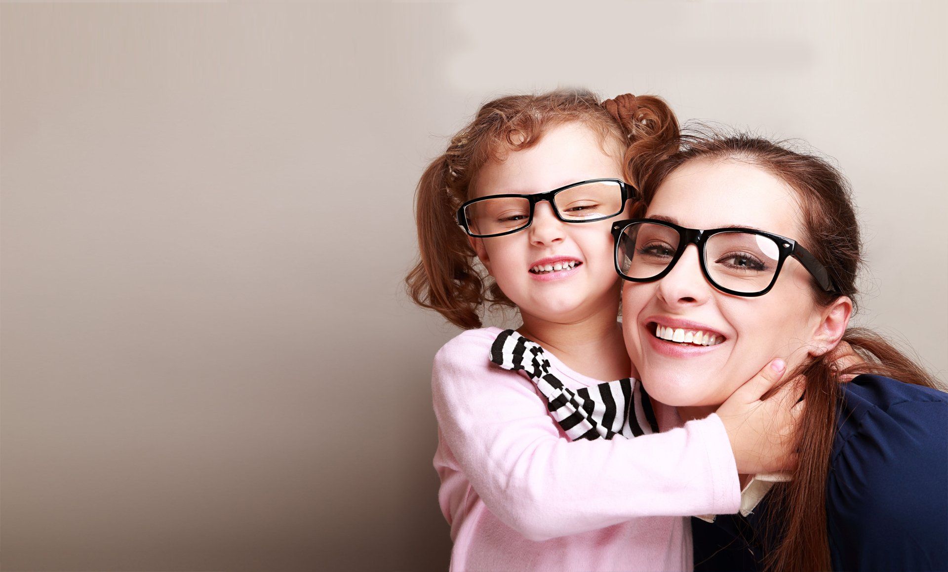 mother and daughter smiling