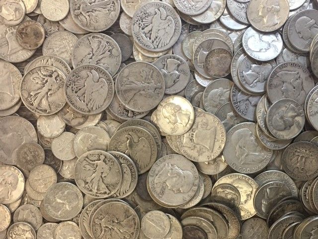 There are many different types of coins in this pile.