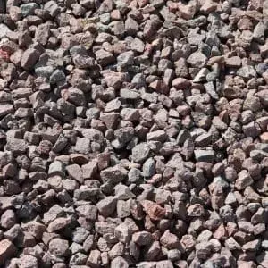 Gravel, small and angular, in shades of gray, brown, and reddish-pink.