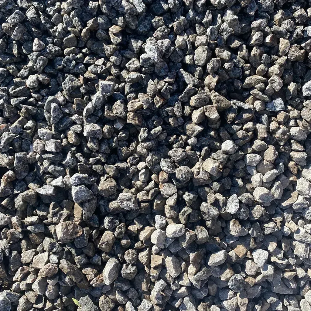 Gray gravel stones, tightly packed together, filling the frame.
