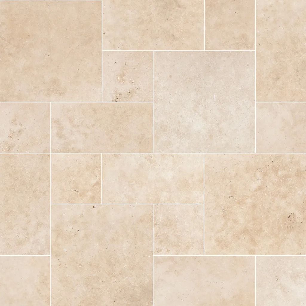 Beige travertine tile floor with rectangular and square patterns.