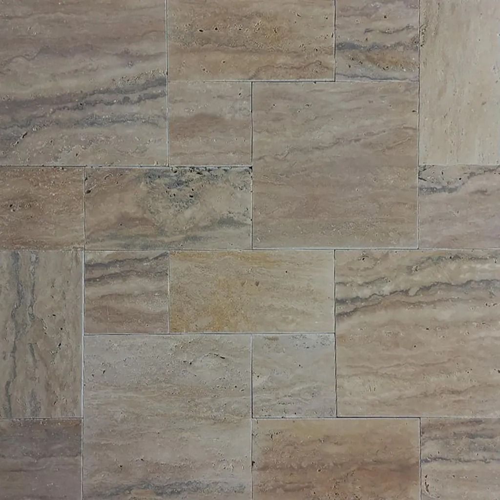 Tiled floor with rectangular beige travertine stone in varying shades.