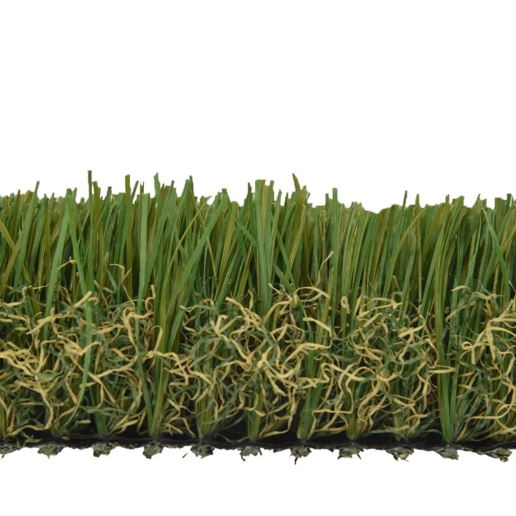 Section of artificial turf, green blades with brown thatch on a black base.