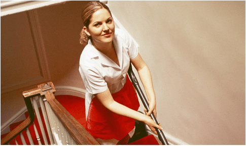 Woman cleaning on the stair