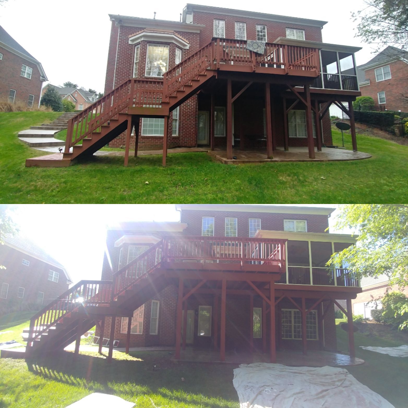 Two-story brick house with a red wooden deck and staircase. The deck has a screened-in porch.
