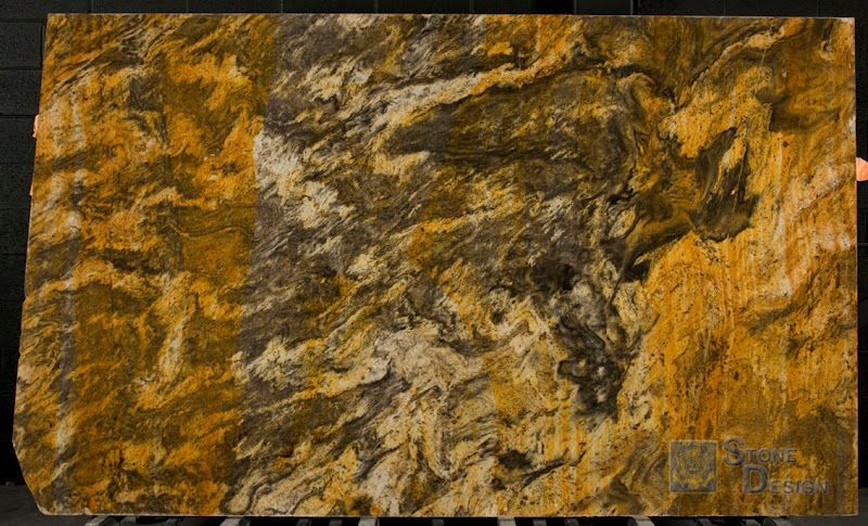 A close up of a piece of granite with a swirl pattern.