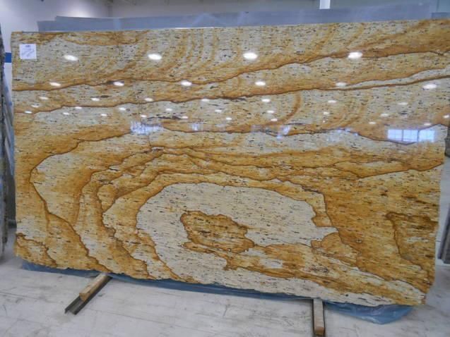 A large slab of granite is sitting on a table.