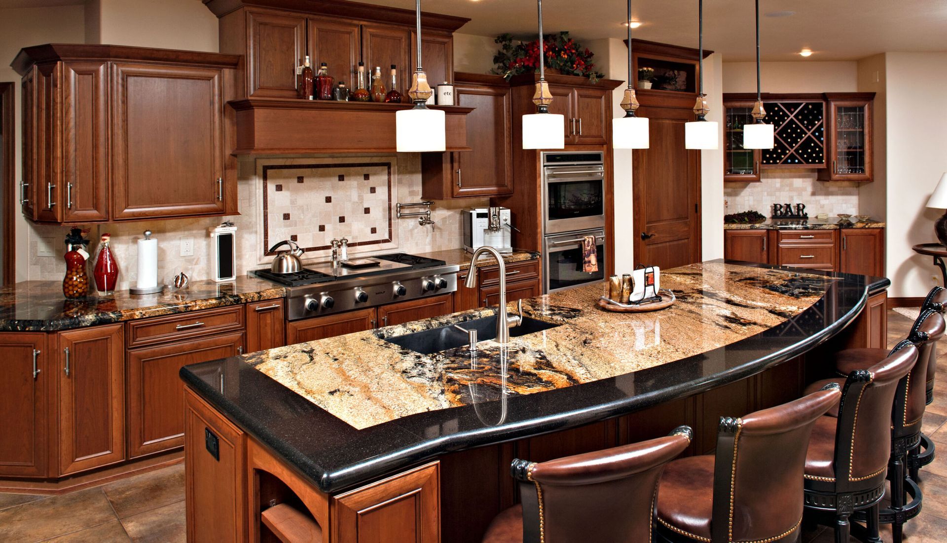 A kitchen with wooden cabinets and granite counter tops