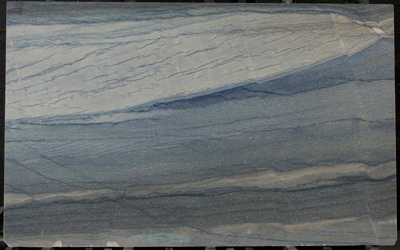 A close up of a blue and white marble slab.