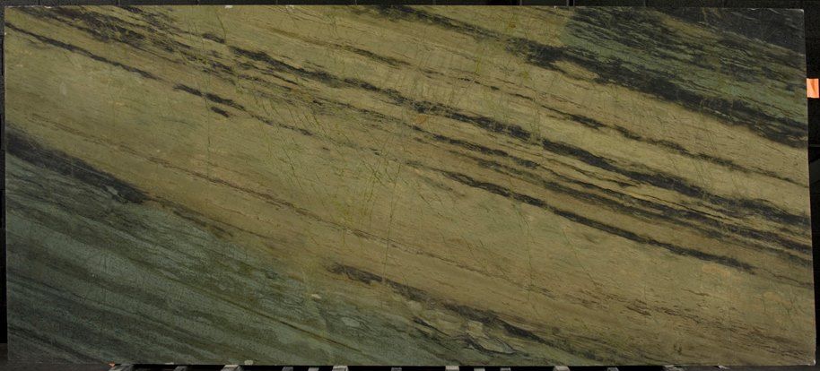 A close up of a marble slab with a striped pattern.