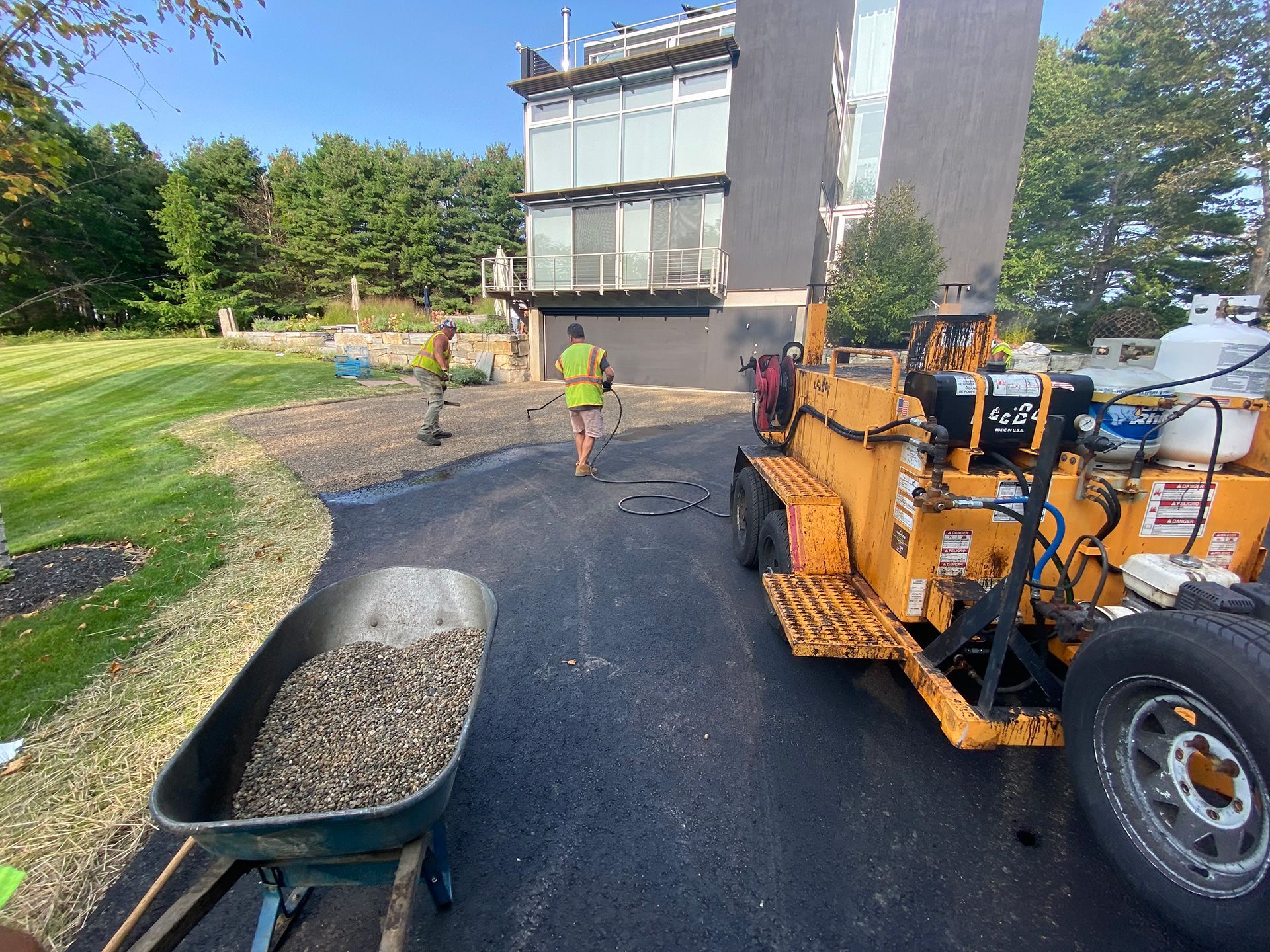 Tar and chip paving work in progress