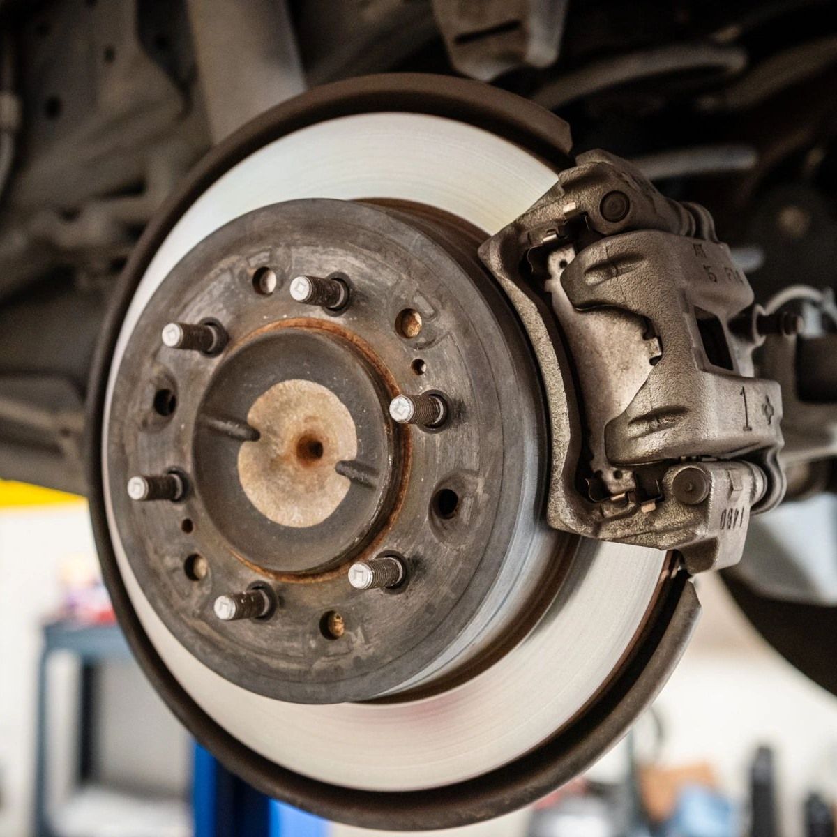 a close up of a brake disc on a car