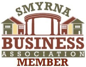 Smyrna Business Association member logo with maroon text and storefront icons
