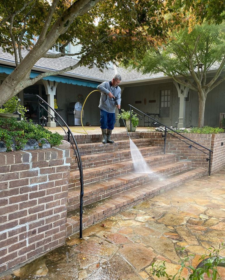 Man power washing