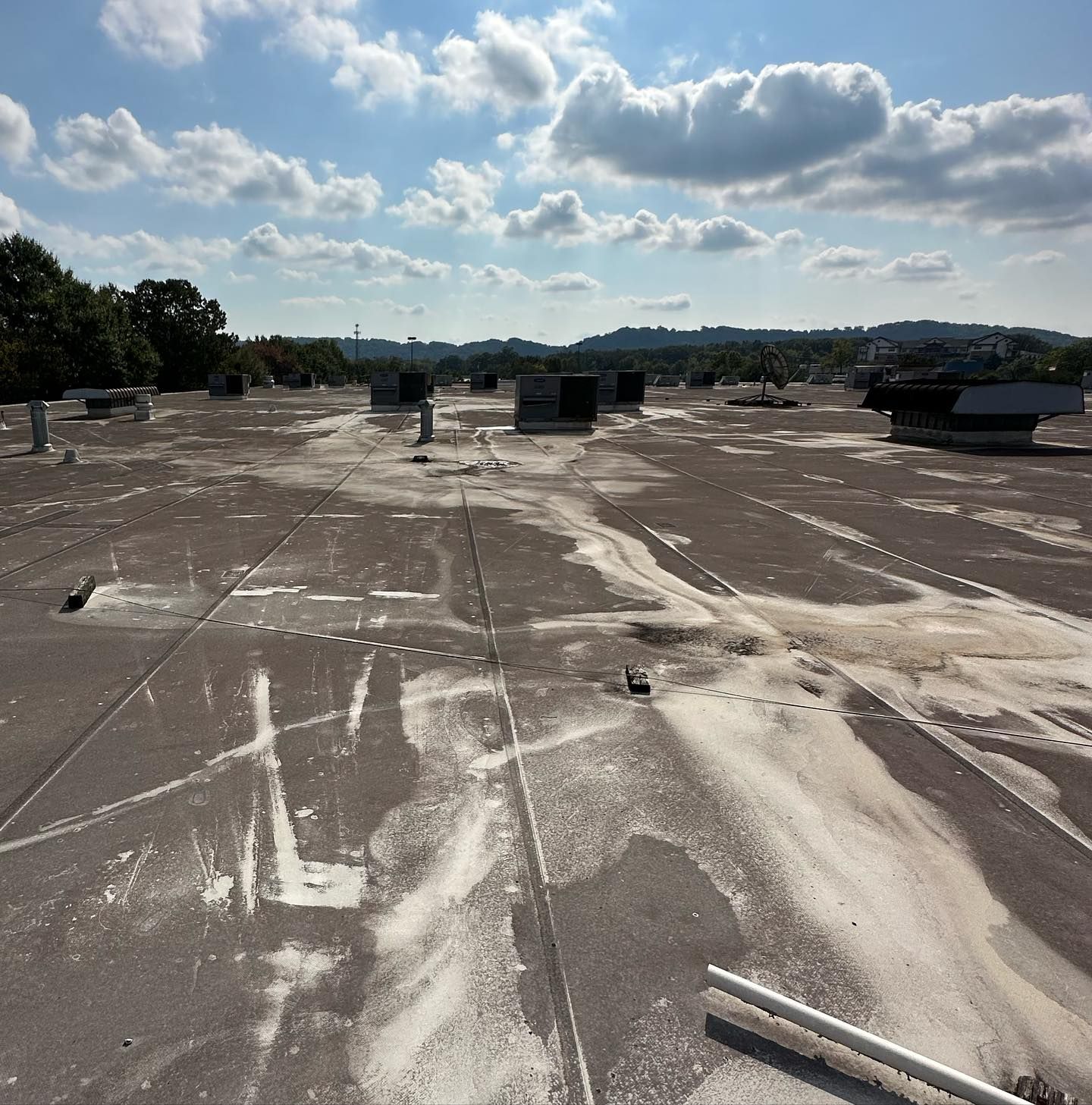 Before commercial roof power washing