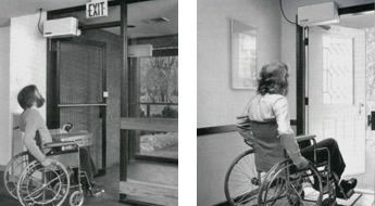 a black and white photo of a man in a wheelchair and a woman in a wheelchair