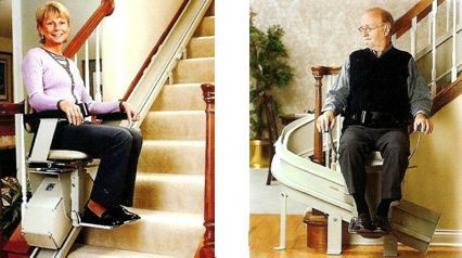 a woman and a man are sitting on a stair lift