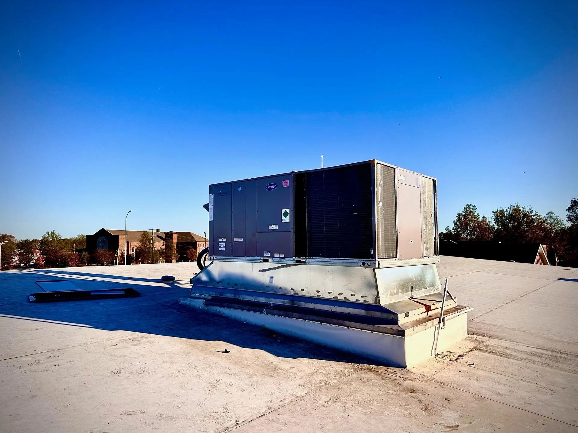 A large commercial HVAC system on the rooftop.