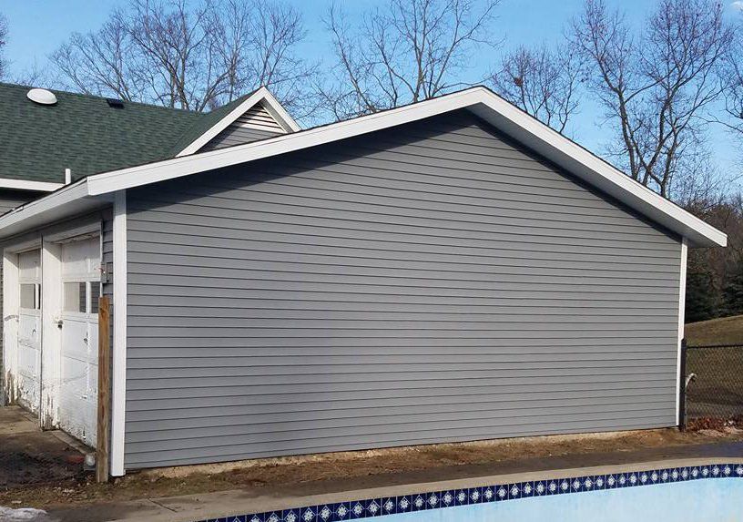 Lake Michigan Construction & Roofing Roofer Holland, MI