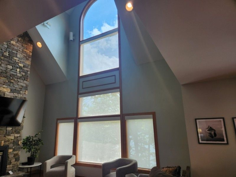 Windows film with motorized solar shades