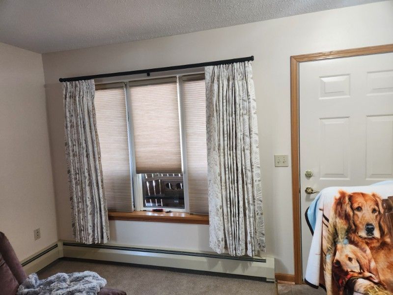 Layered windows treatments , windows film , honey comb shades, drapery panels