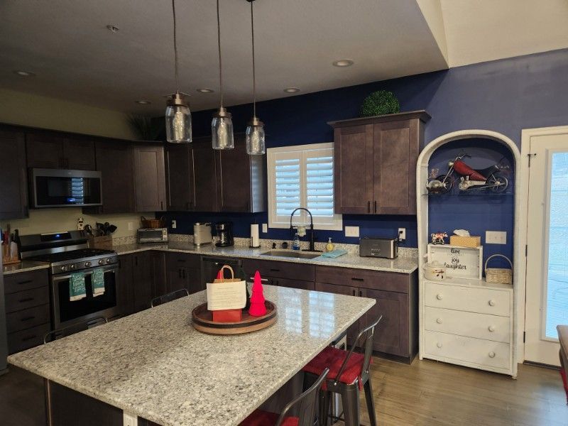 Shutters in a kitchen above the kitchen sink