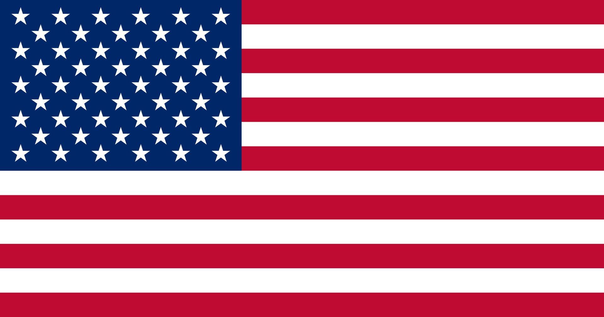 American flag with red and white stripes and blue canton with white stars.