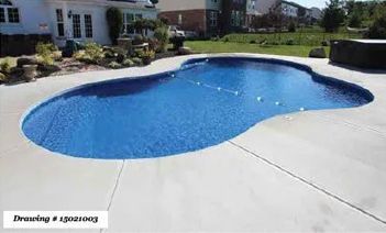 A backyard swimming pool with blue water and a surrounding concrete deck, near a residential home and a hot tub.