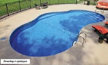 A kidney-shaped swimming pool with blue water and a tan concrete deck, surrounded by a black fence and lounge chairs.