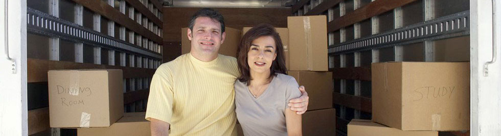 Couple in moving truck