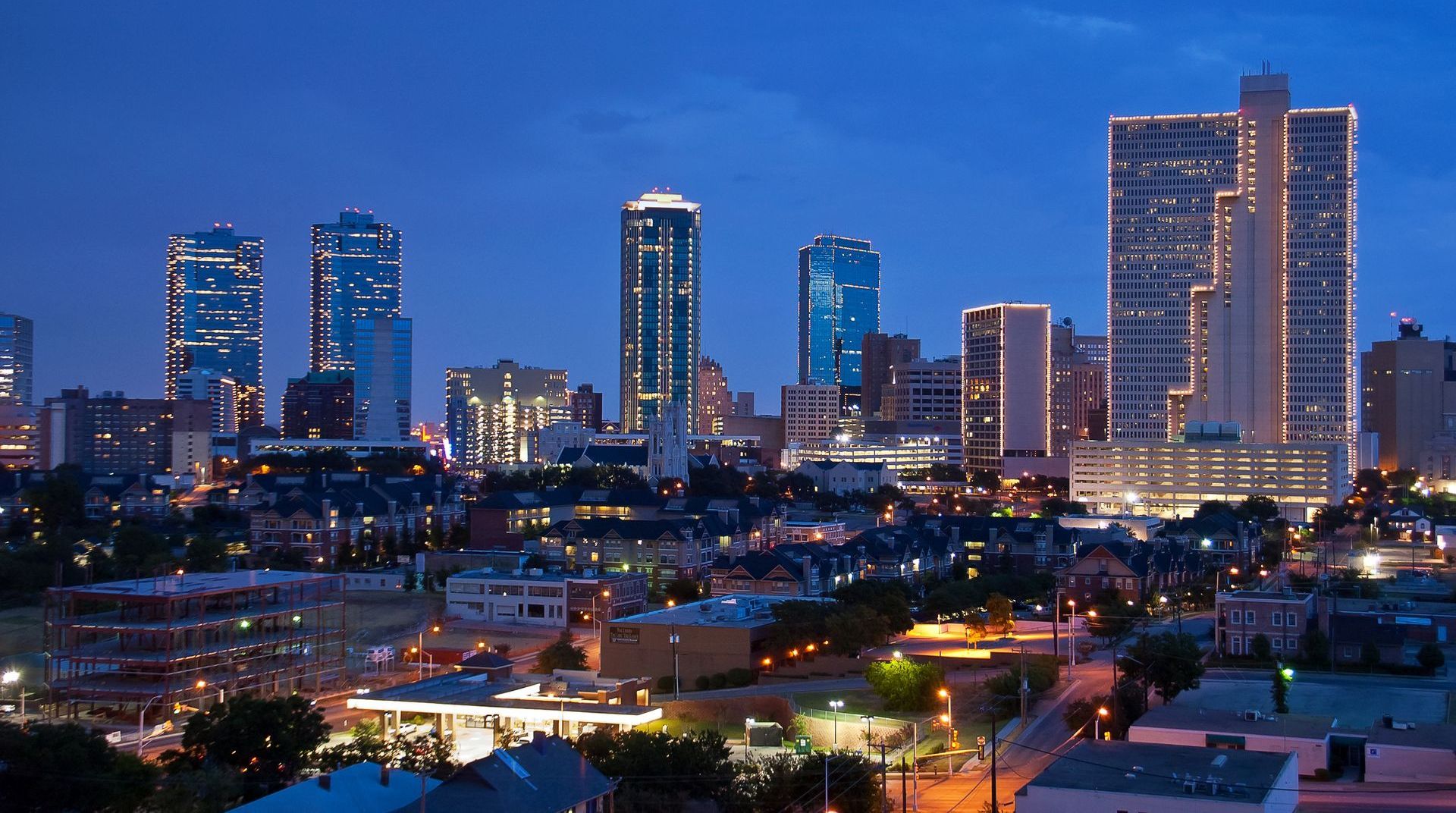 An aerial view of a fort worth tx skyline at night